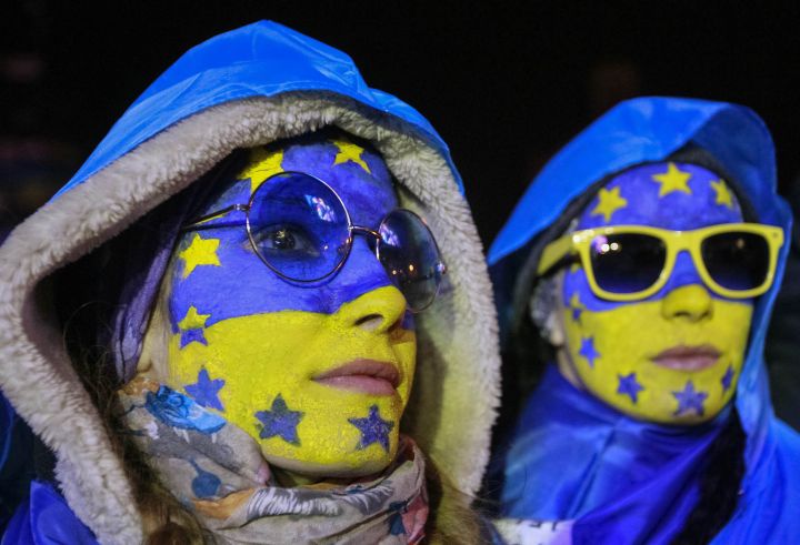 People supporting an EU integration attend a rally at Independence Square in Kiev
