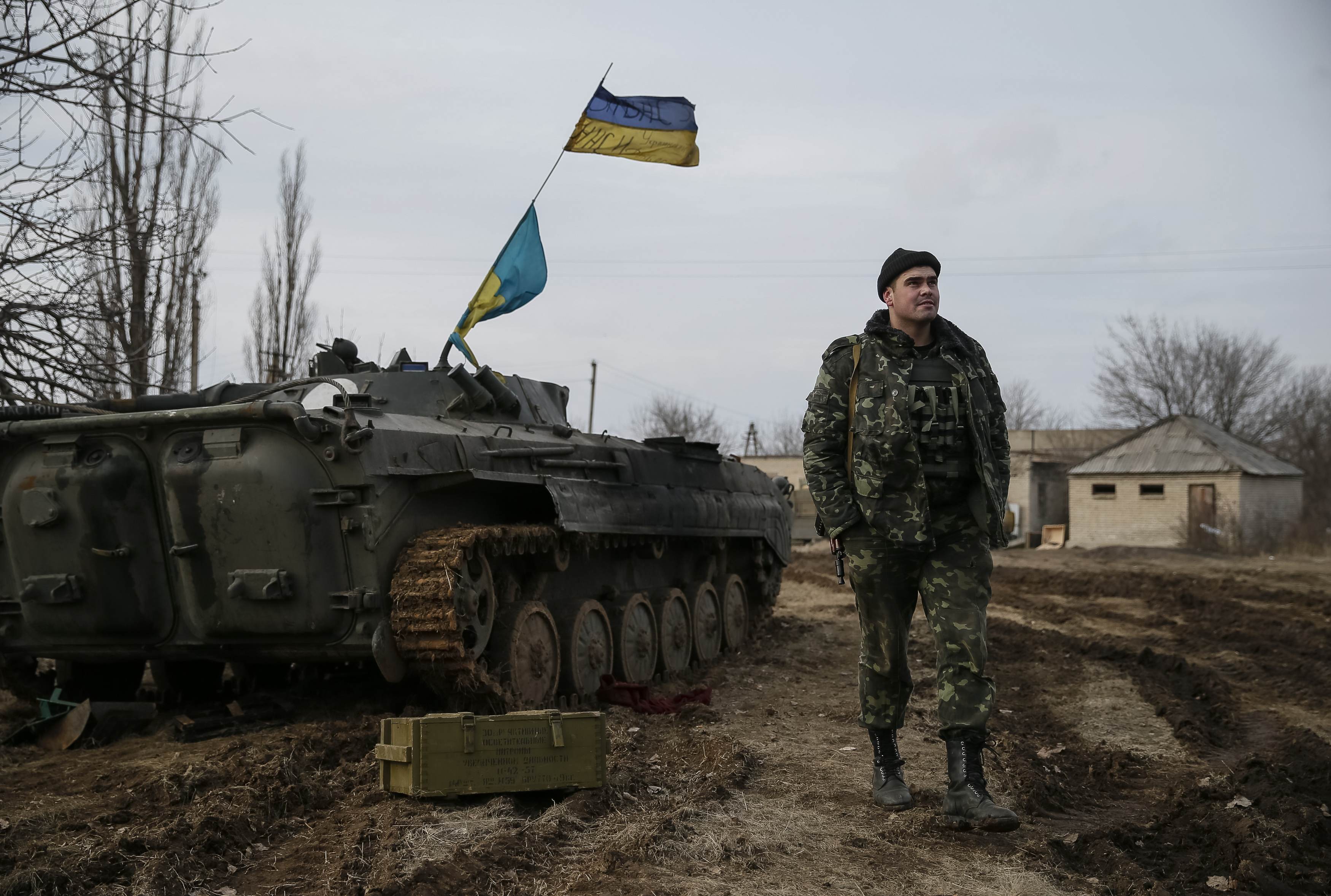 A Ukrainian serviceman is pictured at his position near Debaltseve